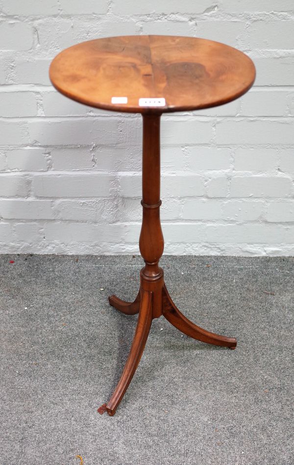 A 19th century provincial yew oval top occasional table, on tripod base, 37cm wide x 67cm high.