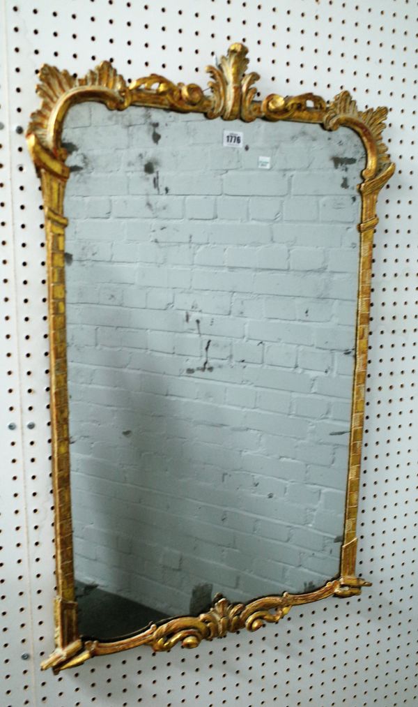 A mid-18th century gilt framed mirror with scroll moulded frame, 59cm wide x 93cm high.