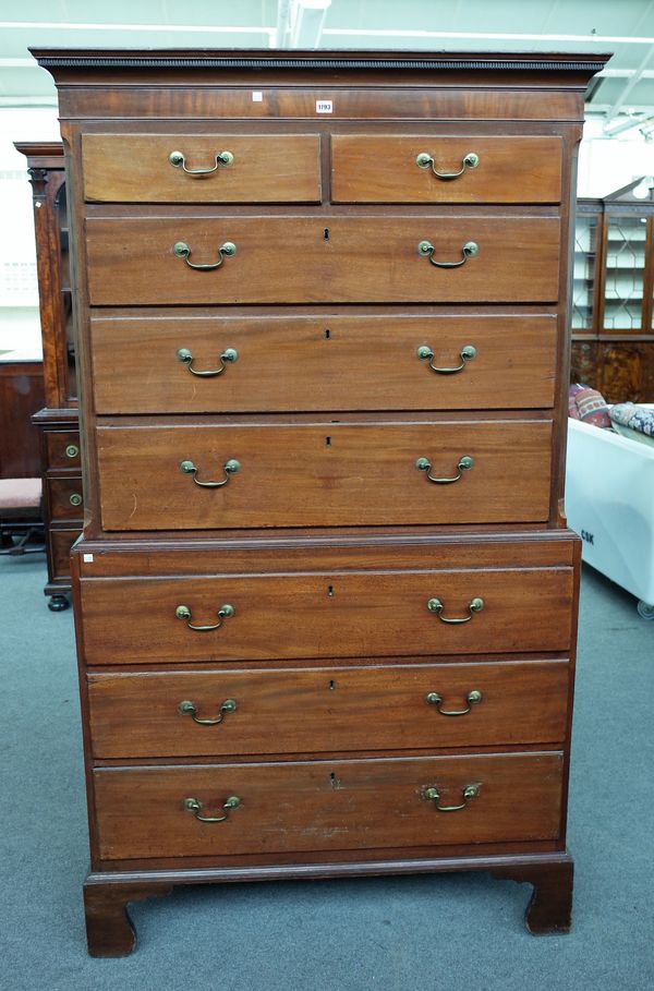 A George III mahogany chest on chest of two short over six long graduated drawers on bracket feet, 112cm wide x 200cm high.