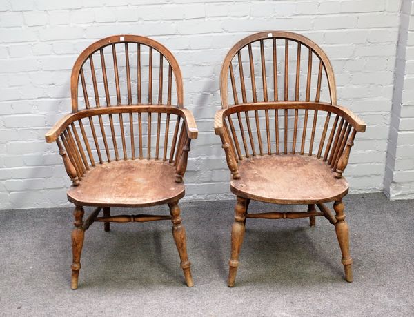 A pair of ash and elm stick back Windsor chairs, on turned supports, 64cm wide x 102cm high, (2).