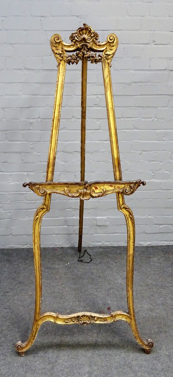 A 19th century French gilt 'A' framed artist's easel with rococo scroll decoration, 72cm wide at base x 165cm high.