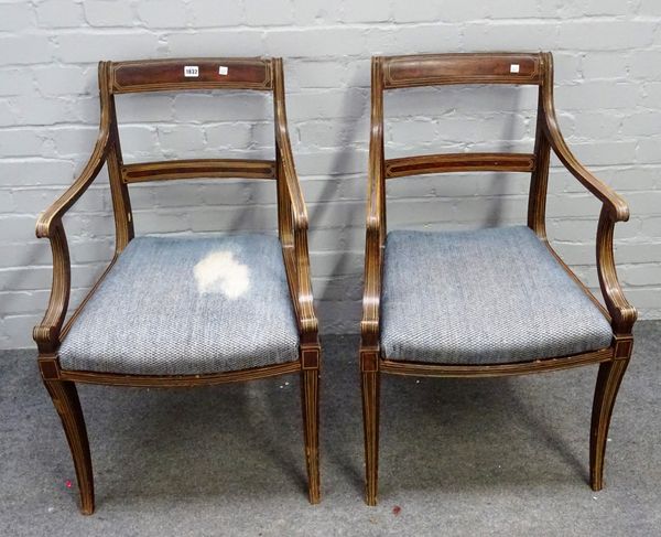 A set of six 19th century faux rosewood grained and polychrome painted dining chairs on sabre supports, including a pair of carvers, (6).