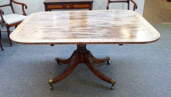 A George III crossbanded mahogany rectangular snap top breakfast table with four downswept supports, 119cm wide x 150cm long.