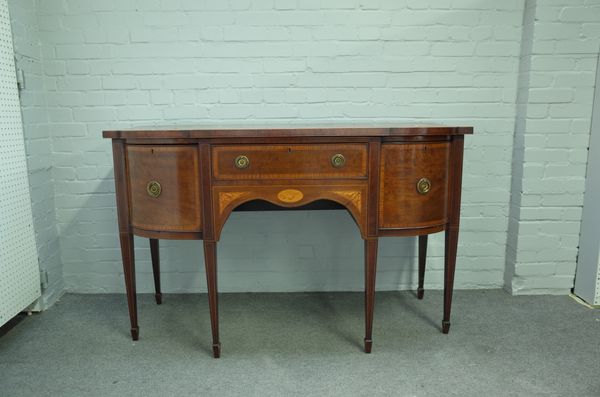 A George III satinwood banded mahogany breakfront sideboard, with three frieze drawers, on tapering square supports, 153cm wide x 95cm high.