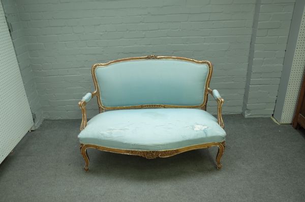 A 19th century French gilt framed sofa /canape with serpentine seat on scroll supports, 123cm wide x 90cm high.