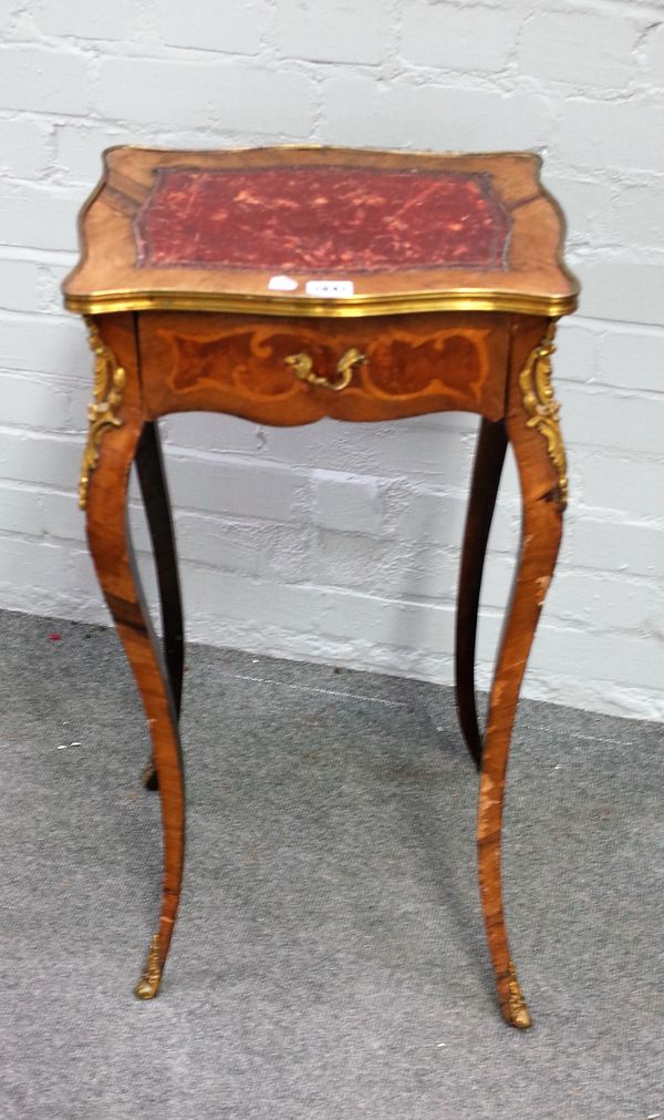 A late 19th century French gilt metal mounted mahogany walnut and rosewood single drawer side table on cabriole supports, 39cm wide x 74cm high.