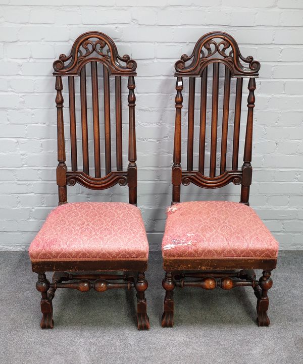 A pair of 18th century Anglo Dutch walnut framed high back side chairs on knurll feet, 47cm wide x 121cm high.