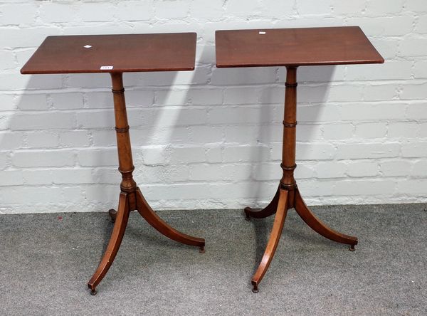 A pair of George III mahogany tripod bases with turned columns, the rectangular tops later, 47cm wide x 73cm high.