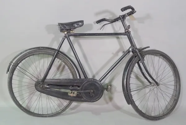 An early 20th century black painted single speed bicycle.   HANG