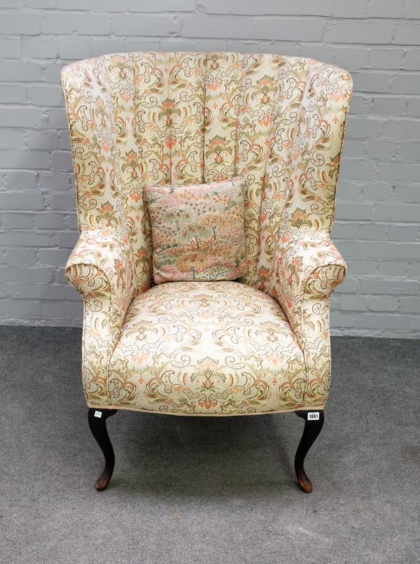 A George III style tub back armchair, circa 1900, on cabriole supports, 76cm wide x 112cm high.