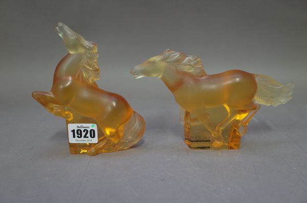 A Lalique crystal cachet cheval Or (seal horse gold) etched mark to base (11cm high); and another Lalique amber glass horse in differing pose, also wi