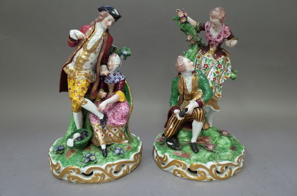 A pair of Samson figure groups of `The shoe-maker' and `The shoe-black' after Derby originals, 25.5cm high, (2).