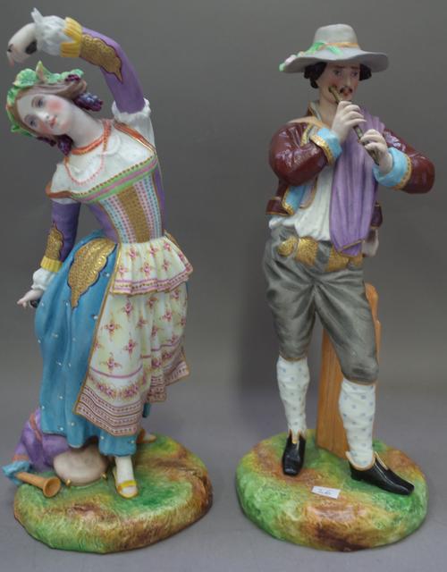 A pair of Gilles Jeune, Paris, porcelain figures, late 19th century, the male figure modelled playing a flute, the lady dancing with maracas in her ha