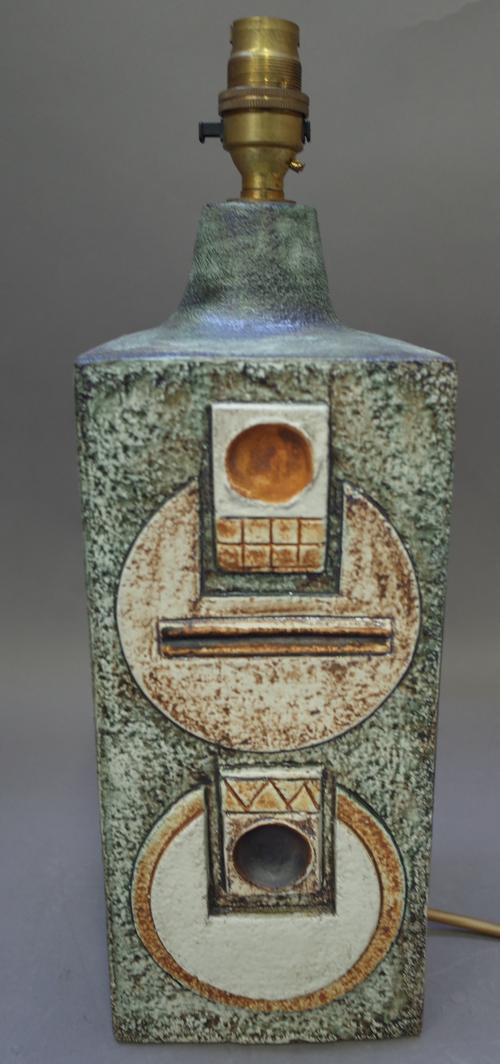 A Troika pottery table lamp by Linda Hazel, circa. 1972, double sided geometric decoration against a green, square form body, signed 'TROIKA' with art