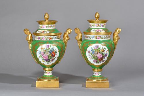 A pair of Paris (Feuillet) porcelain green ground two handled ice pails, covers and liners, C.1830, painted factory marks, 42cm high (a.f) (2).  Illus