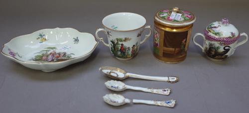 A group of Continental porcelains, 19th century, comprising; a Paris porcelain cylindrical jar and cover painted with a soldier holding a baby, 10cm.