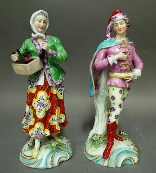 A pair of Samson Chelsea porcelain figures, late 19th century, each modelled on a gilt scroll base, with gold anchor mark to rear, 25cm high (2).
