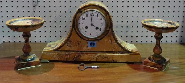 An early 20th century orange marble mantel clock with two garnitures, 32cm wide x 24cm high, (3).   A4