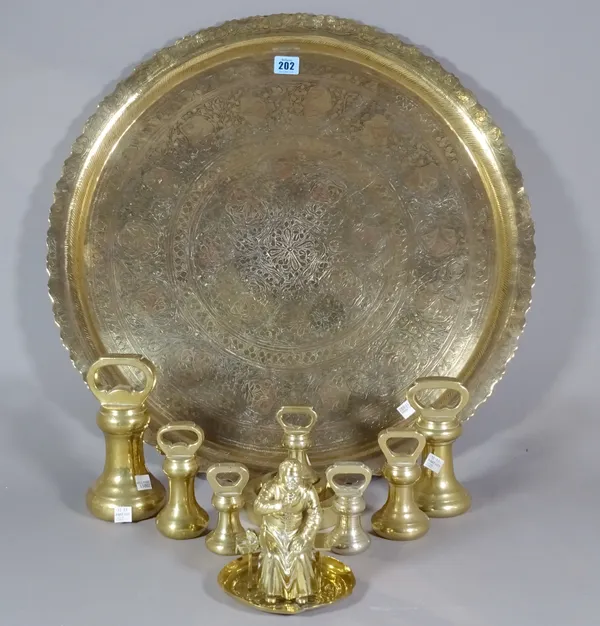 Brassware, including; a circular tray, a figure of a cardinal,13cm high and a quantity of weights, (qty).   S2B