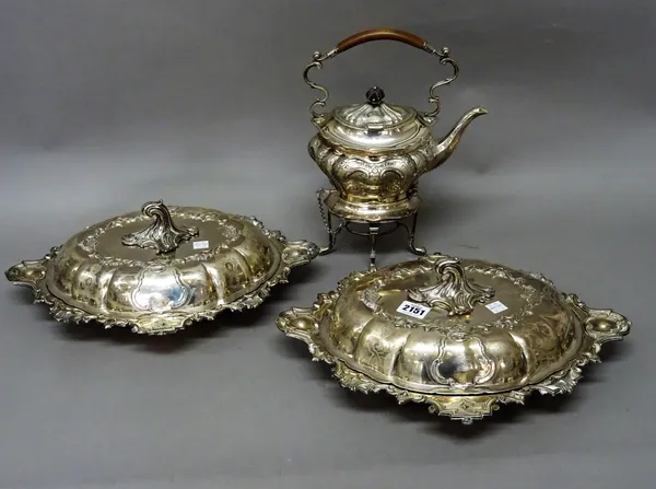 Plated wares, comprising; a pair of shaped oval Victorian lidded entree dishes, with engraved decoration, decorated with borders of scrolls and having