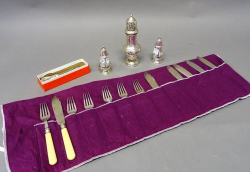 Silver, comprising; a baluster shaped sugar caster, the hallmark rubbed and a pair of baluster shaped pepper casters, London 1929, combined weight 245