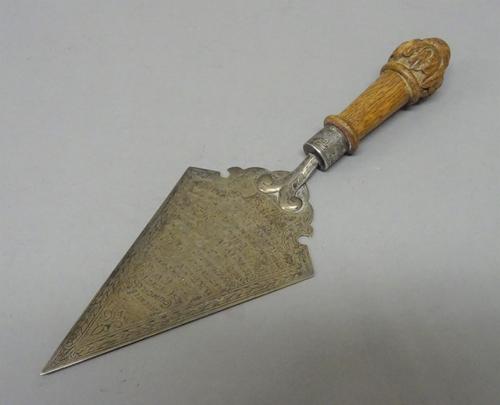 A silver presentation masonary trowel, the inscription detailed 'Presented to Councillor Mrs Catherine Gates, Chairman of The Electricity Committee, a