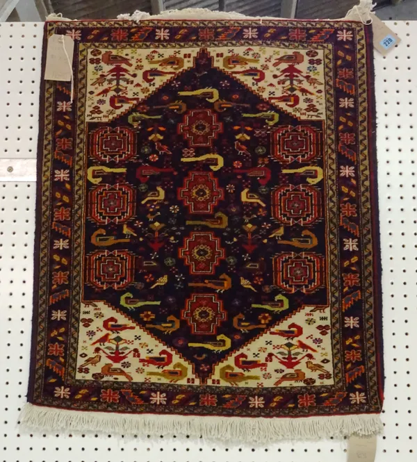 A Caucasian rug, 81cm x 69cm.  D5