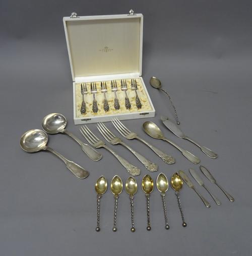 Foreign flatware, comprising; a set of six pastry forks, the handles with cast scrolling decoration, detailed 830 S, with a case, detailed Tostrup, th