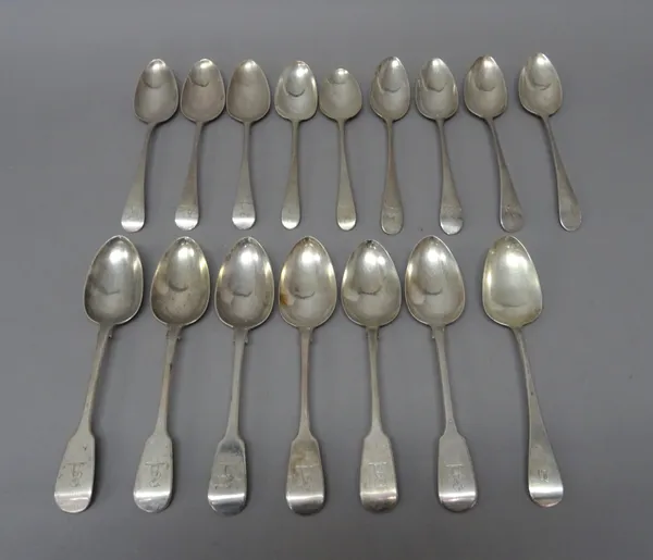 Silver tablespoons, comprising; a set of six fiddle pattern tablespoons, crest engraved, London 1831, four Old English pattern tablespoons, London 179