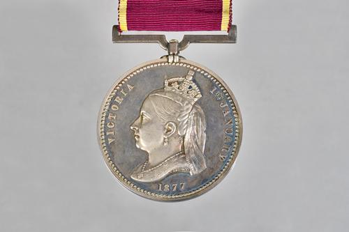 The Empress of India Medal, the obverse detailed Victoria 1st January 1877, un-named as issued, with the original fitted case, detailed C.C.Adams, F.S