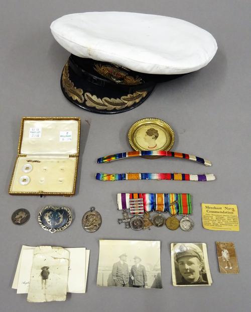 A group of six dress miniature medals, comprising; The Military Cross, The Queens South Africa with five bars, the 1914-15 Star, The British War Medal