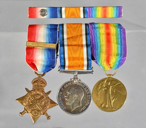 A group of three First World War medals, comprising; The 1914 Star with sew on bar to L3 / 2649. S.W.PLEDGER, A.B.R.N.V.R. HAWKE.BTTN.R.N.D, The 1914-