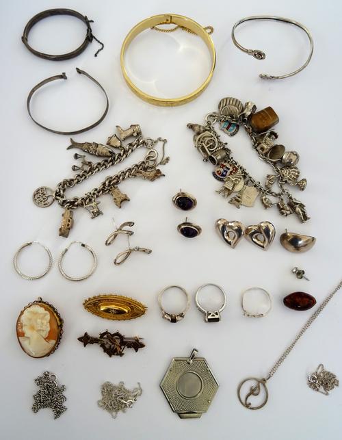 AQ gold and diamond set oval brooch, detailed 15 CT, an oval shell cameo brooch, a 9ct gold brooch with a bird and floral motifs, Birmingham 1900 and