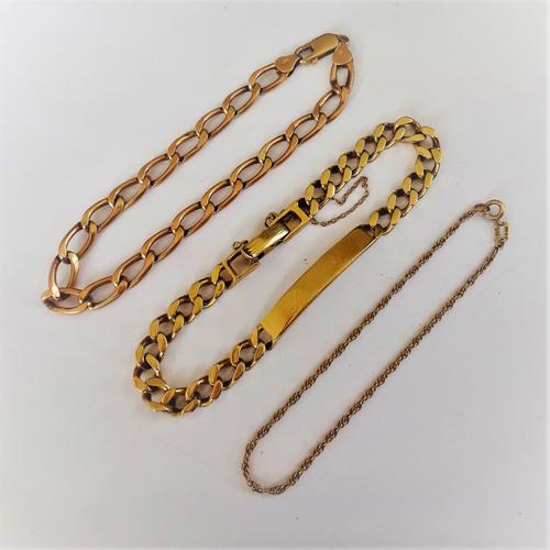 A 9ct gold faceted curb link identity bracelet, on a foldover clasp and two further 9ct gold bracelets, combined weight 24.5 gms, (3).