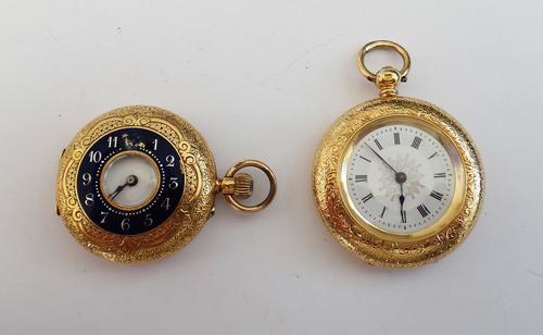 A gold cased lady's key wind, openfaced fob watch, with a gilt, jewelled cylinder movement, gilt metal inner case, the enamelled dial with Roman numer