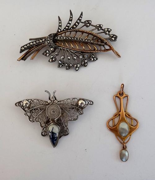 A gold and blister pearl pendant, pierced in an Art Nouveau design, detailed to the back B.H.J. 9 CT, a gold and silver, marcasite set brooch, designe