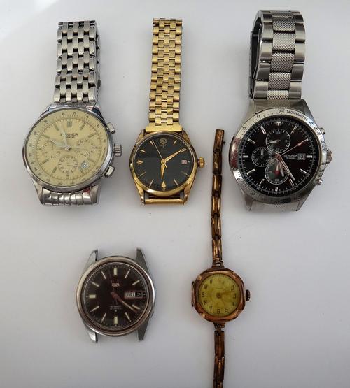 A Tudor Prince-Oysterdate rotor self winding, gilt metal fronted and steel backed gentleman's wristwatch, the signed black dial with gilt arrow shaped