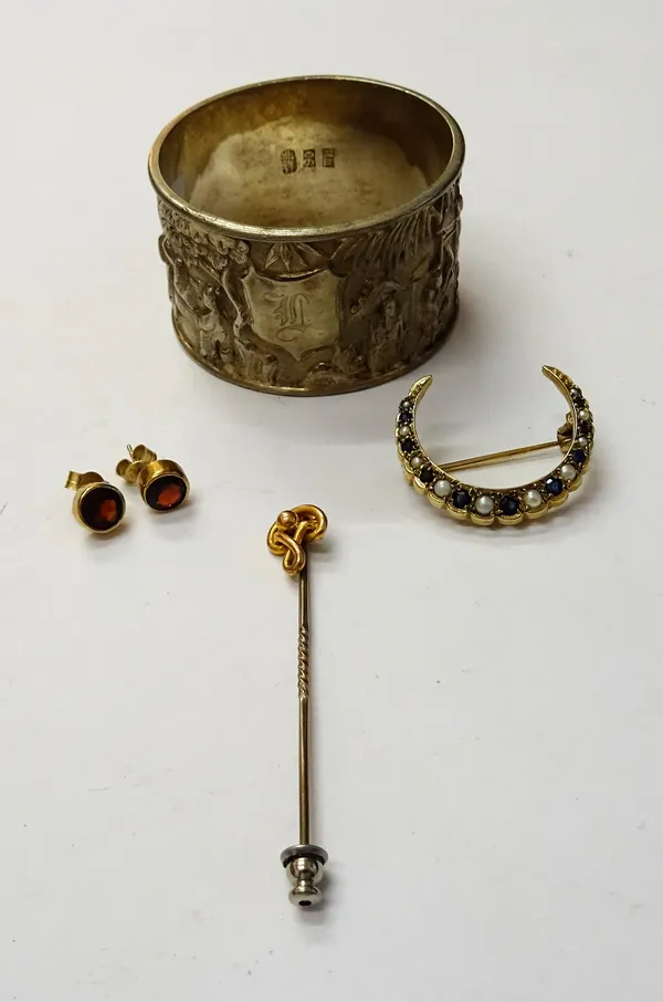 A 9ct gold, sapphire and cultured pearl brooch designed as a crescent, a gold topped stick pin, detailed 9 C, a pair of garnet set single stone earstu