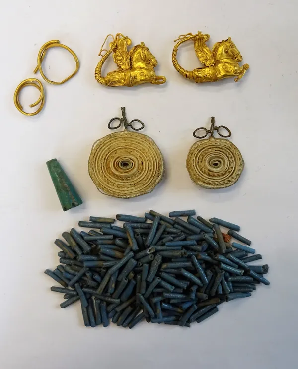 A small group of antiquity and tribal style items, comprising; a pair of hollow earrings, each designed as Pegasus, two earrings of coiled form, two b