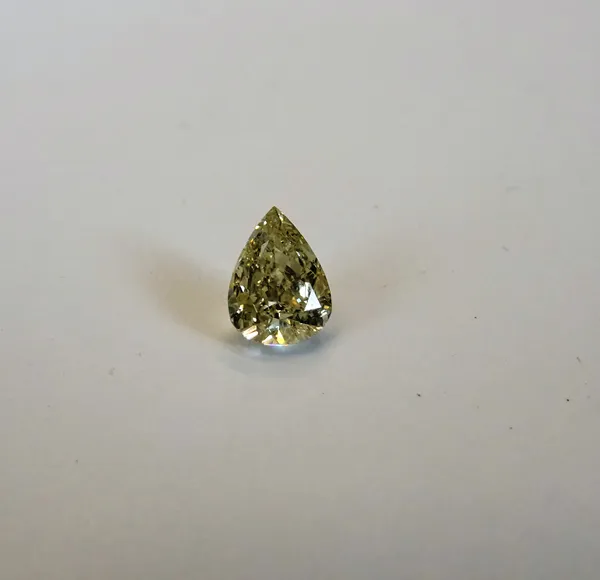 A pear-cut diamond, 0.72ct., colour S/Z range, SI2.This Lot is subject to VAT on the hammer.