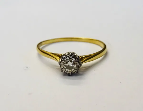 An 18ct gold and diamond set single stone ring, mounted with a circular cut diamond, London 1978, ring size R.