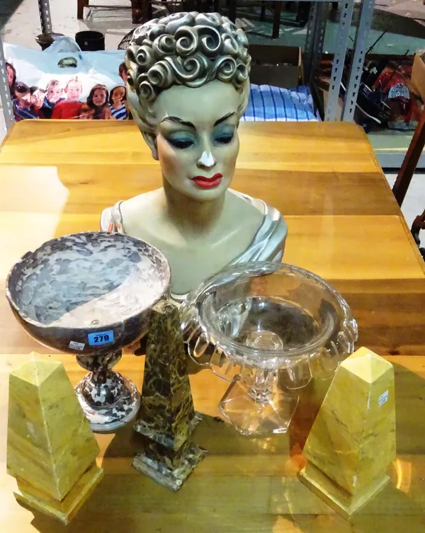 Collectables, including; a pair of yellow wooden obelisks, a marble centre piece bowl, a glass centre piece bowl and a plaster bust of a female, (qty)