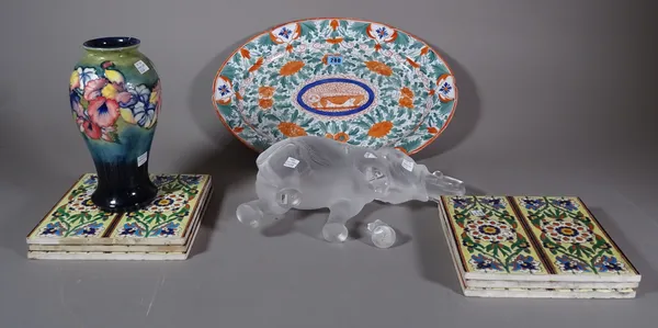 Ceramics, including; six decorated ceramic tiles, a Lalique model of an elephant, a Moorcroft vase, an oval plate decorated in red and green, (a.f.),