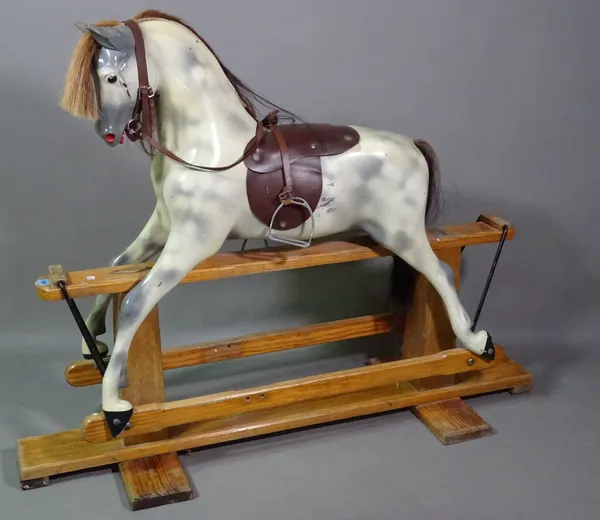 Haddon Rockers; a 20th century grey painted rocking horse on pine stand, 125cm long x 107cm high.    BAY 2