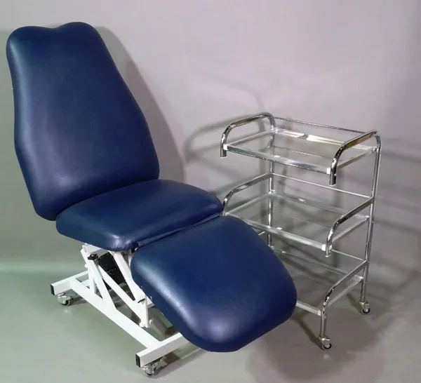 An electric adjustable medical chair and stainless steel three tier trolley, (2).   K8
