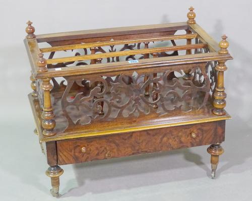 A Victorian walnut three division Canterbury with fret cut decoration and single drawer to base, 84cm wide x 50cm high.   D9