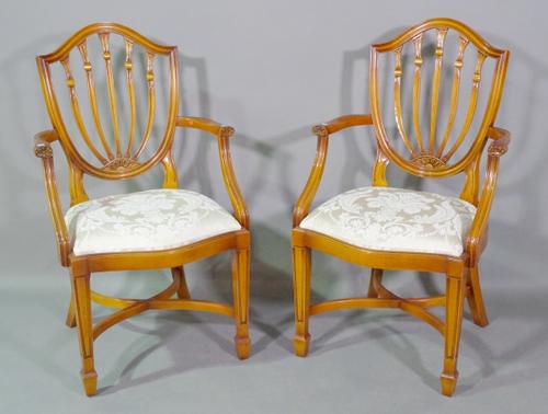 A pair of George III style mahogany shieldback open armchairs, (2).    BAY 1