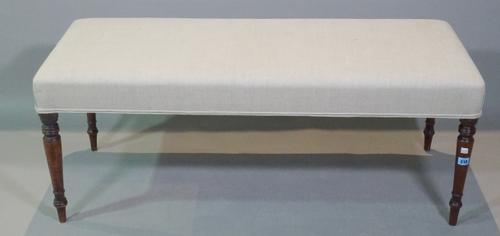 A 19th century and later rectangular footstool on mahogany ring turned tapering supports, 118cm wide x 46cm high.   A6