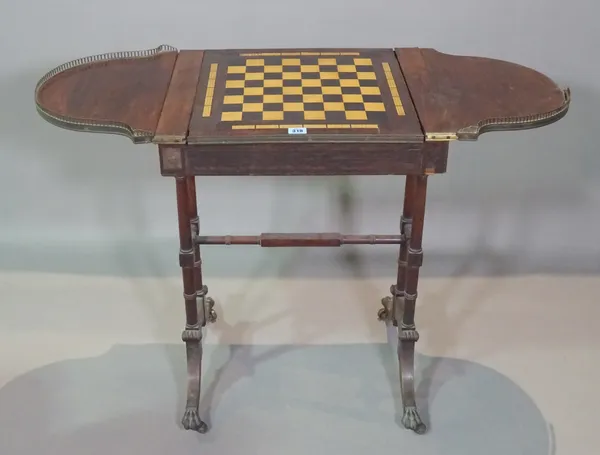 A George IV rosewood combination drop flap games table, 52cm wide x 71cm high.  J9