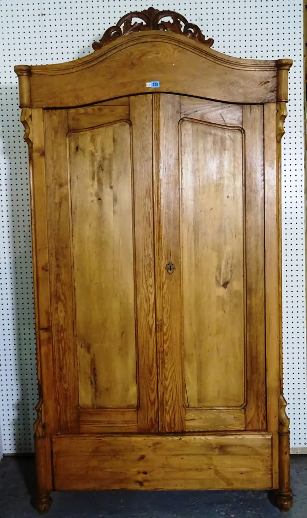 A 19th century French pine two door wardrobe, 107cm wide x 201cm high.   M9